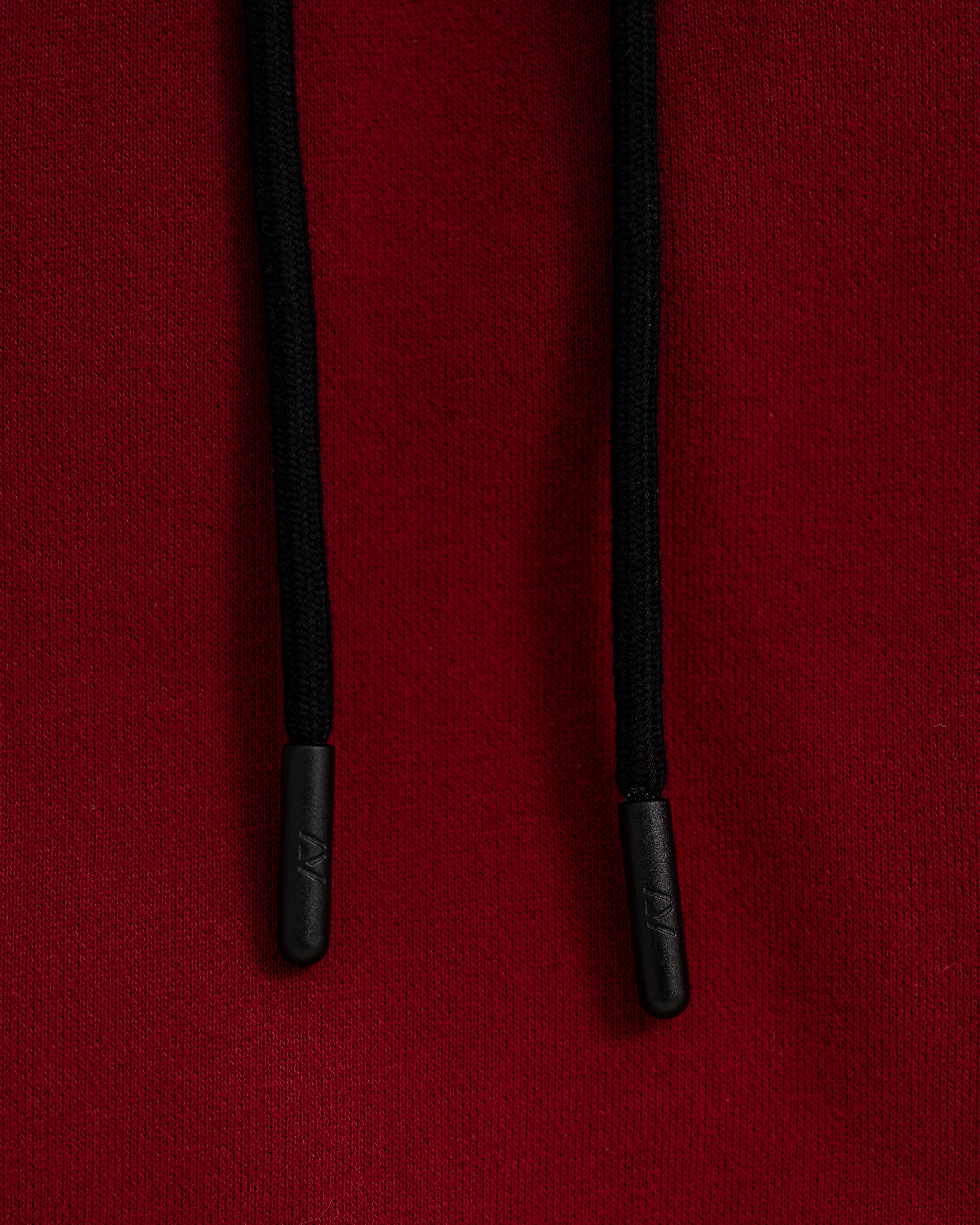 Black drawstrings with black aglets on a red bar grip Hoodie