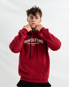 Male wearing a red 'Powerlifting' bar grip hoodie on a white background