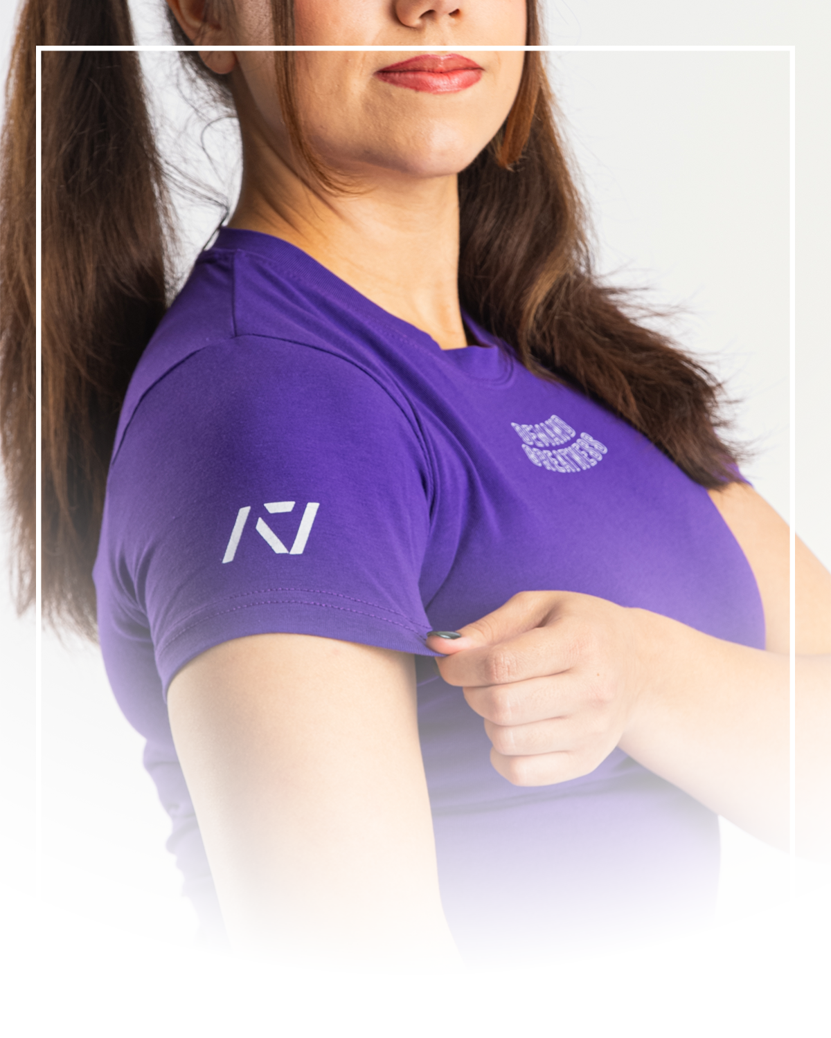 Purple women's meet shirt with A7 logo on sleeve