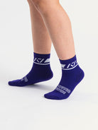 Side profile of A7 Crew Socks in Purple, highlighting the A7 logo on the ankle and compression-style top.