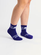 Side profile of A7 Crew Socks in Purple, highlighting the A7 logo on the ankle and compression-style top.