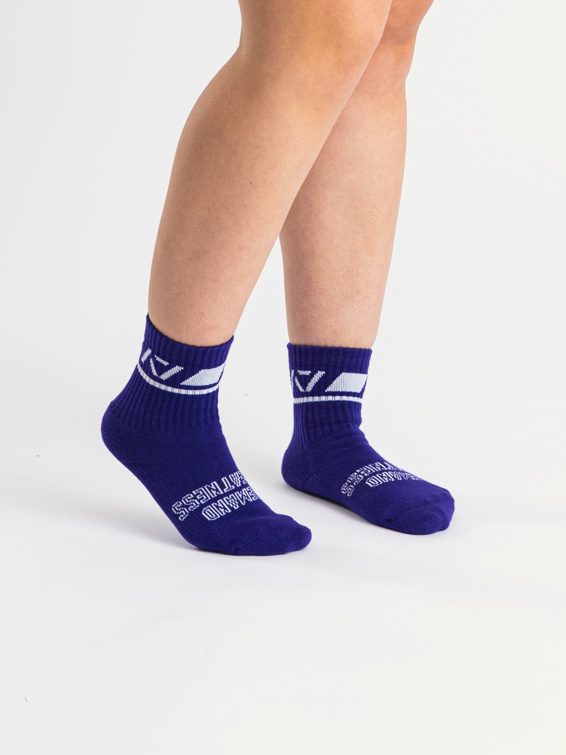 Side profile of A7 Crew Socks in Purple, highlighting the A7 logo on the ankle and compression-style top.