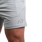 Matte silicone A7 logo on Light Gray 360Go Shorts offering subtle branding and clean aesthetics.