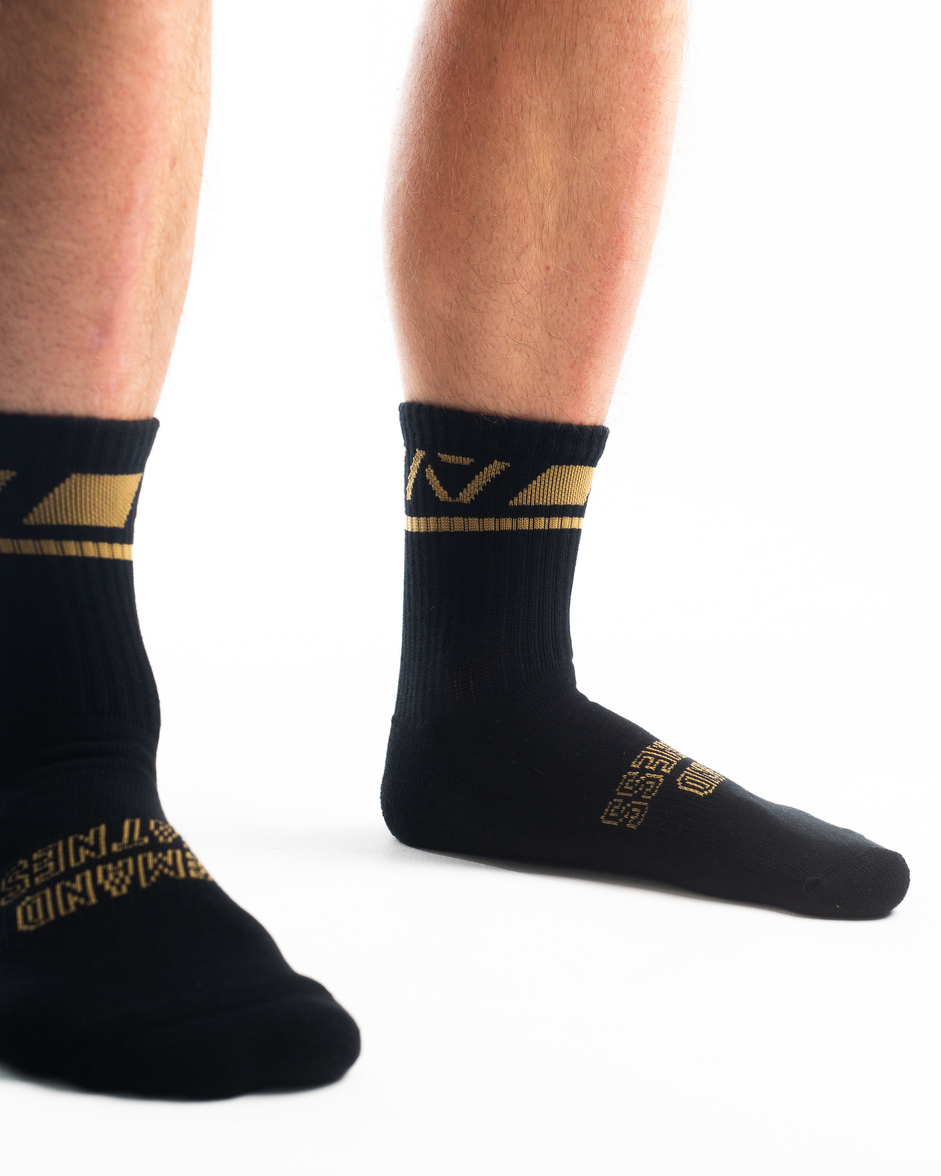 Close-up of the knit fabric on A7 Crew Socks in Gold Standard, showing texture and stitching details.